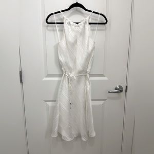 caché white high neck dress with silver thread and beading detail. size small